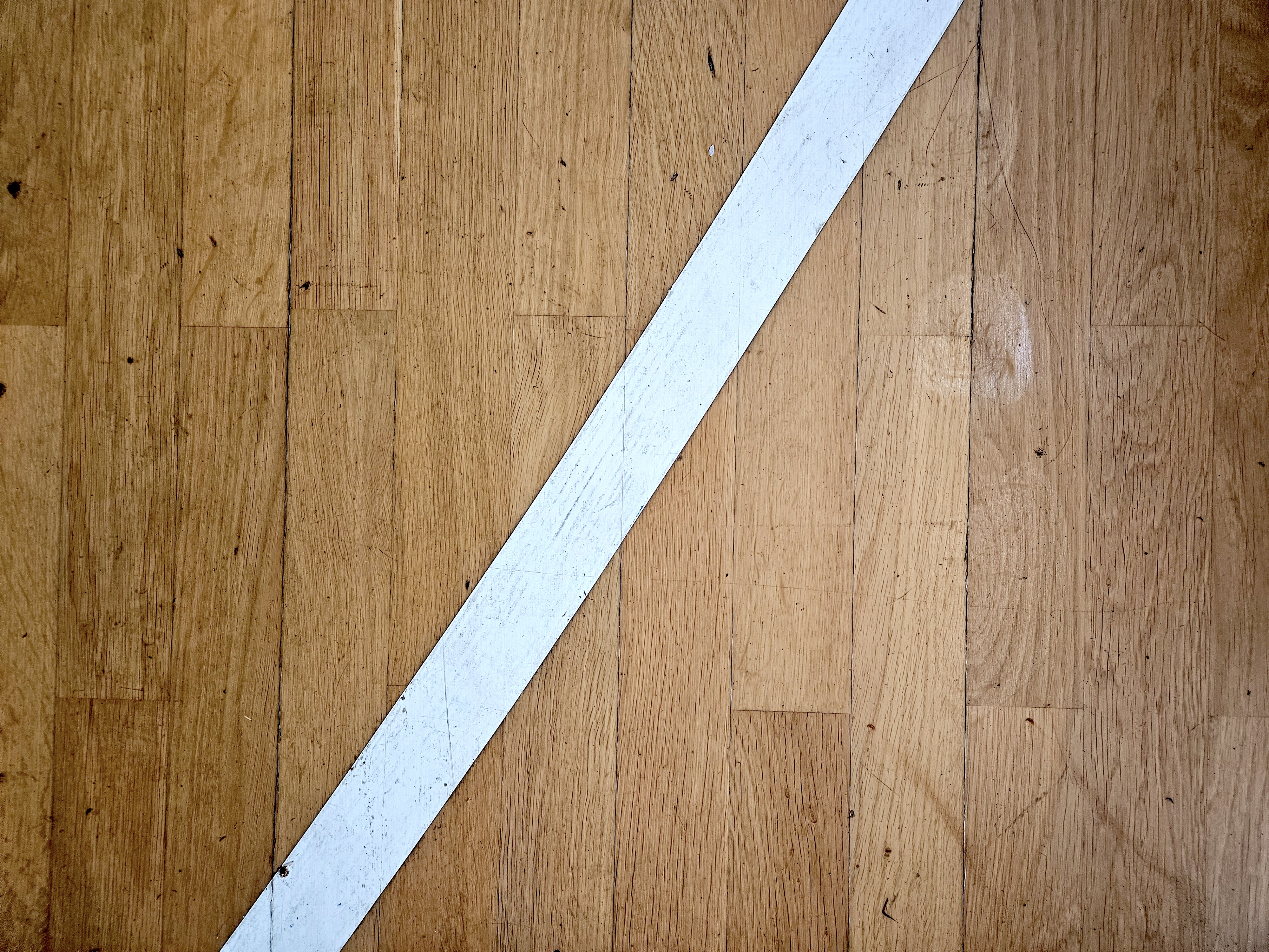 Sports flooring with original markings